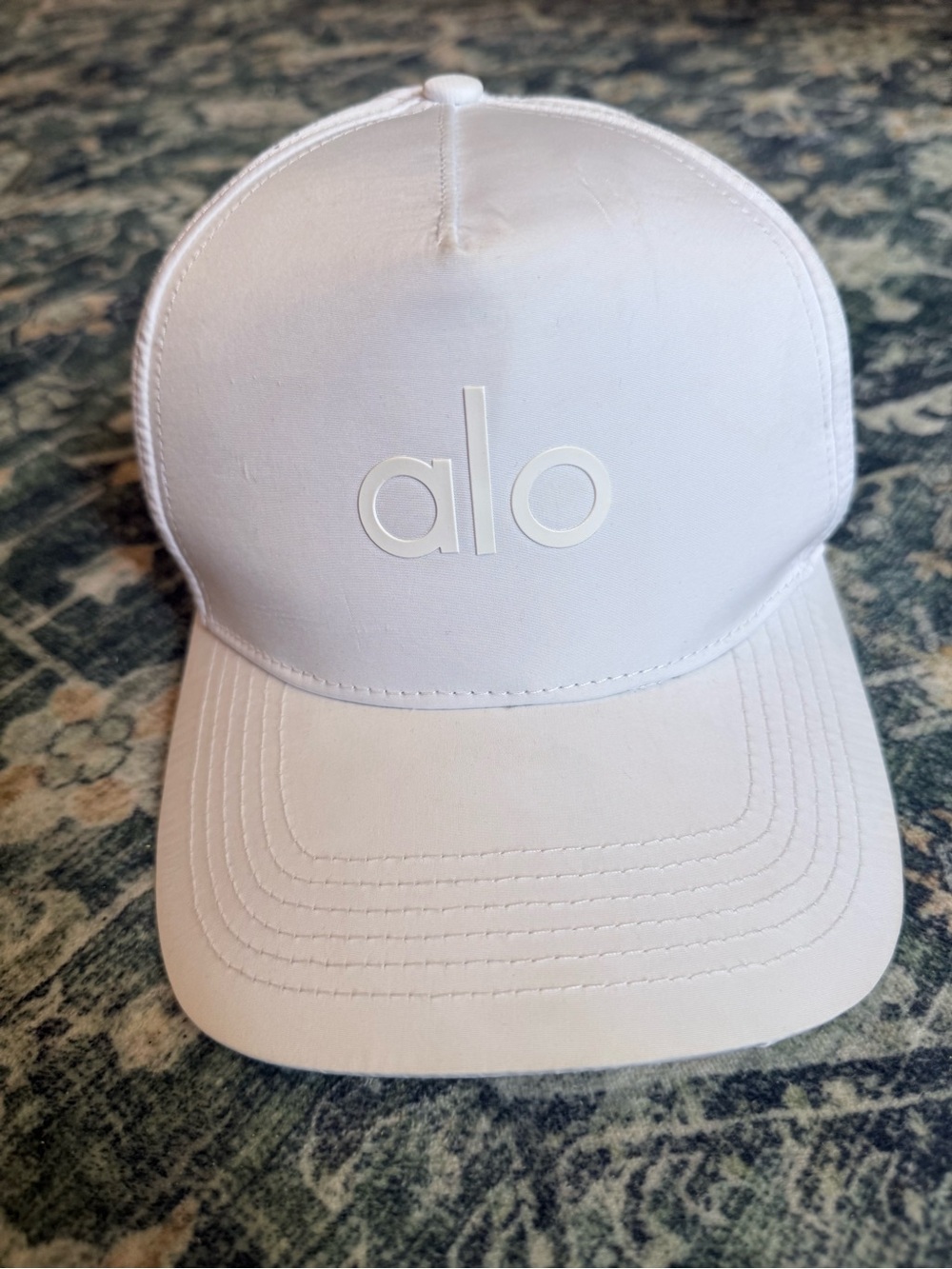 ALO Yoga Performance District Trucker White Logo Cap